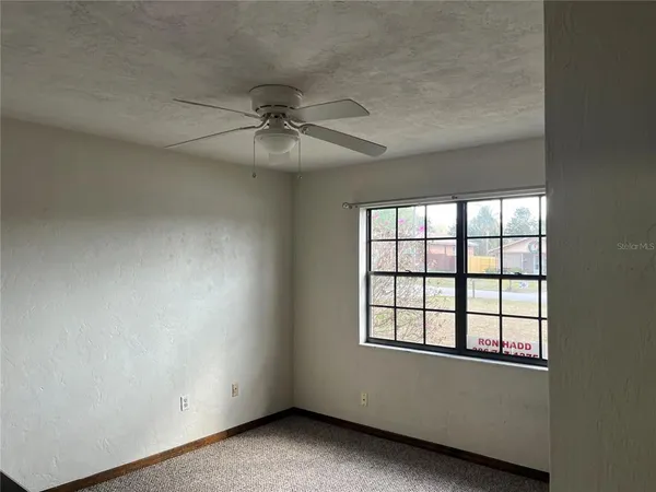 an empty room with a window