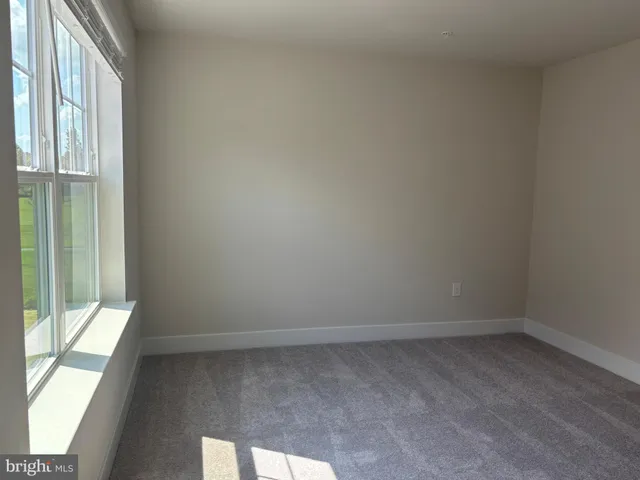 a view of a room with a window