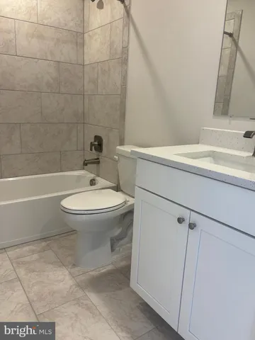 a view of gallery with wooden floor