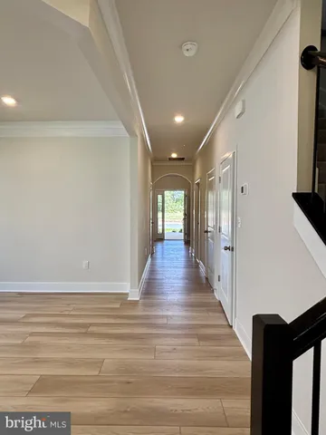 a spacious bathroom with 2 sink and a mirror