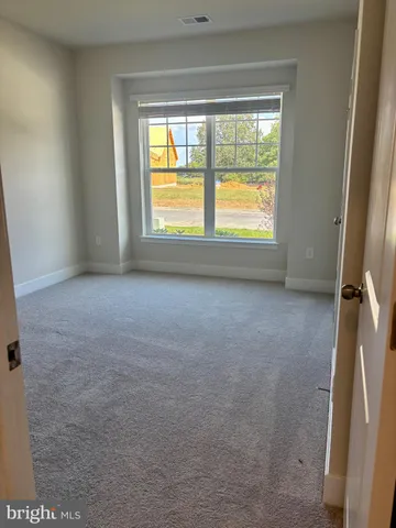 a view of a golf course with a lake