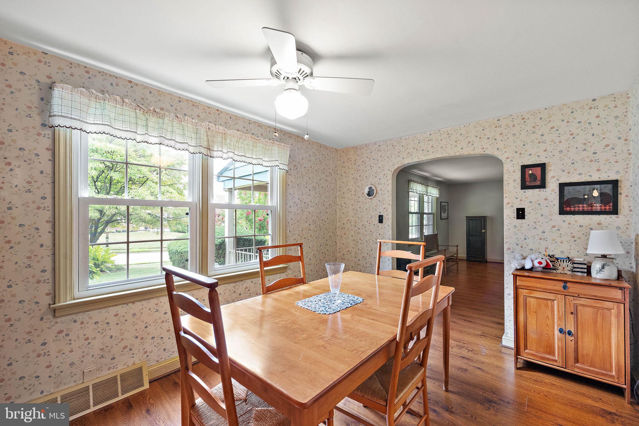 227 Pine Ridge Road Havertown, PA 19083 - Photo 13 of 36 a view of a dining room with furniture window and wooden floor