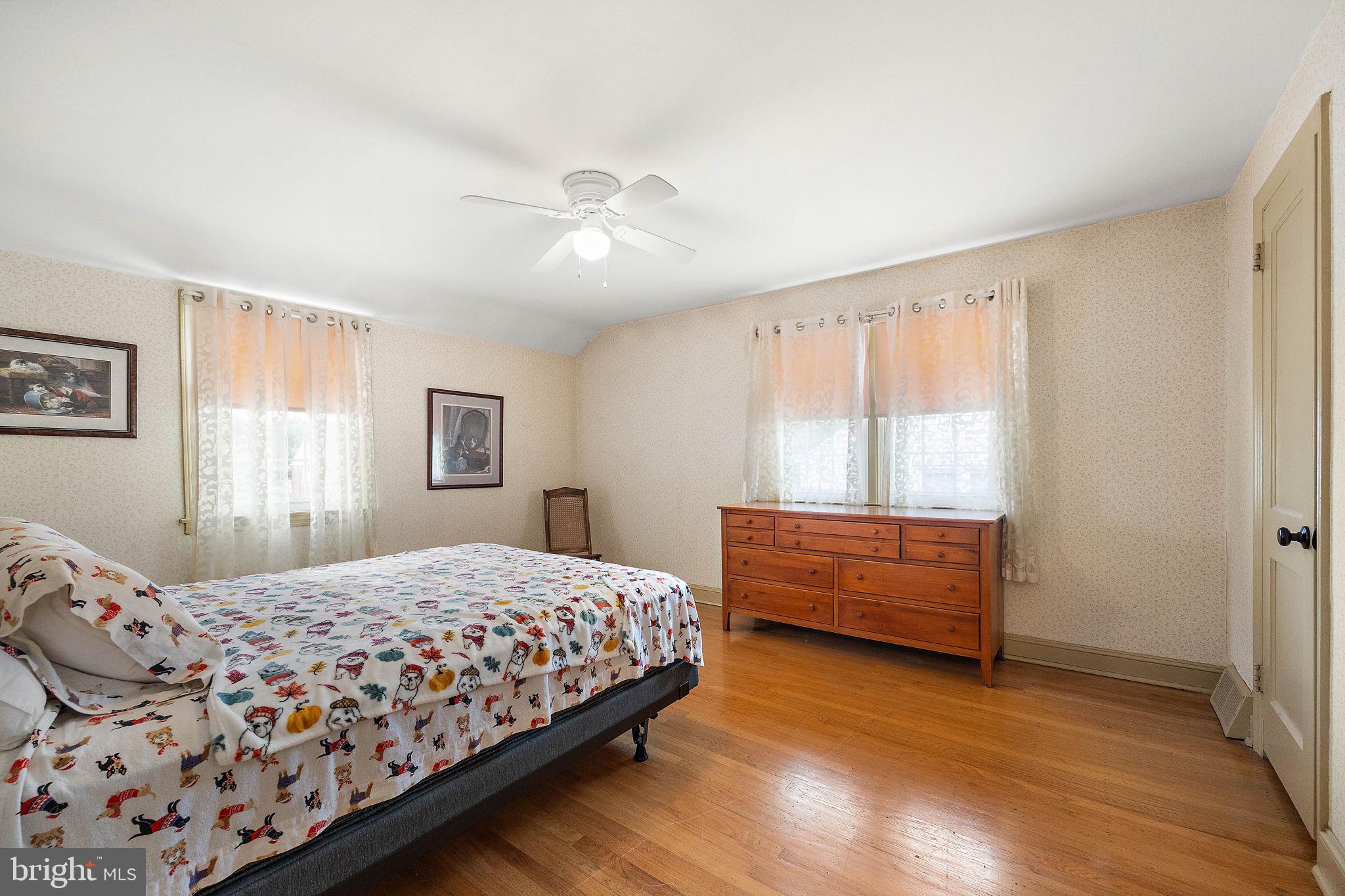 227 Pine Ridge Road Havertown, PA 19083 - Photo 18 of 36 a bedroom with a bed and a window