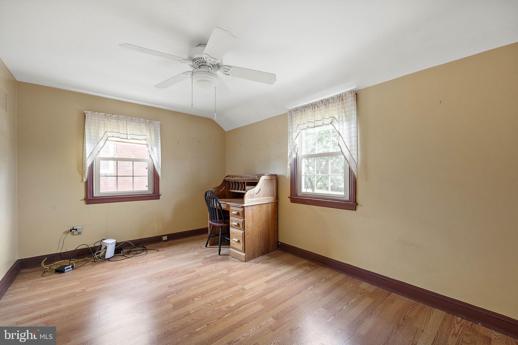 227 Pine Ridge Road Havertown, PA 19083 - Photo 21 of 36 a view of a workspace with furniture and a window
