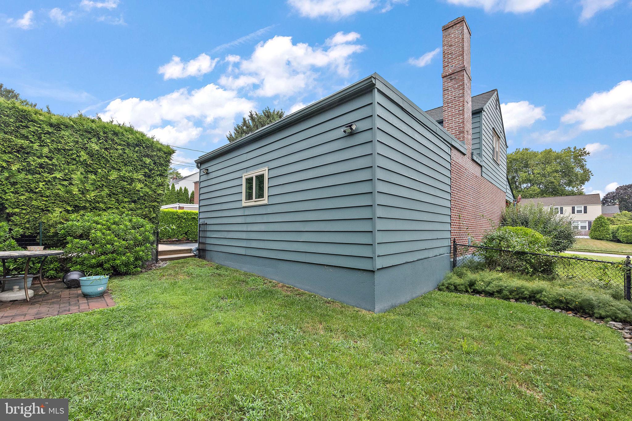 227 Pine Ridge Road Havertown, PA 19083 - Photo 30 of 36 a view of a house with a backyard