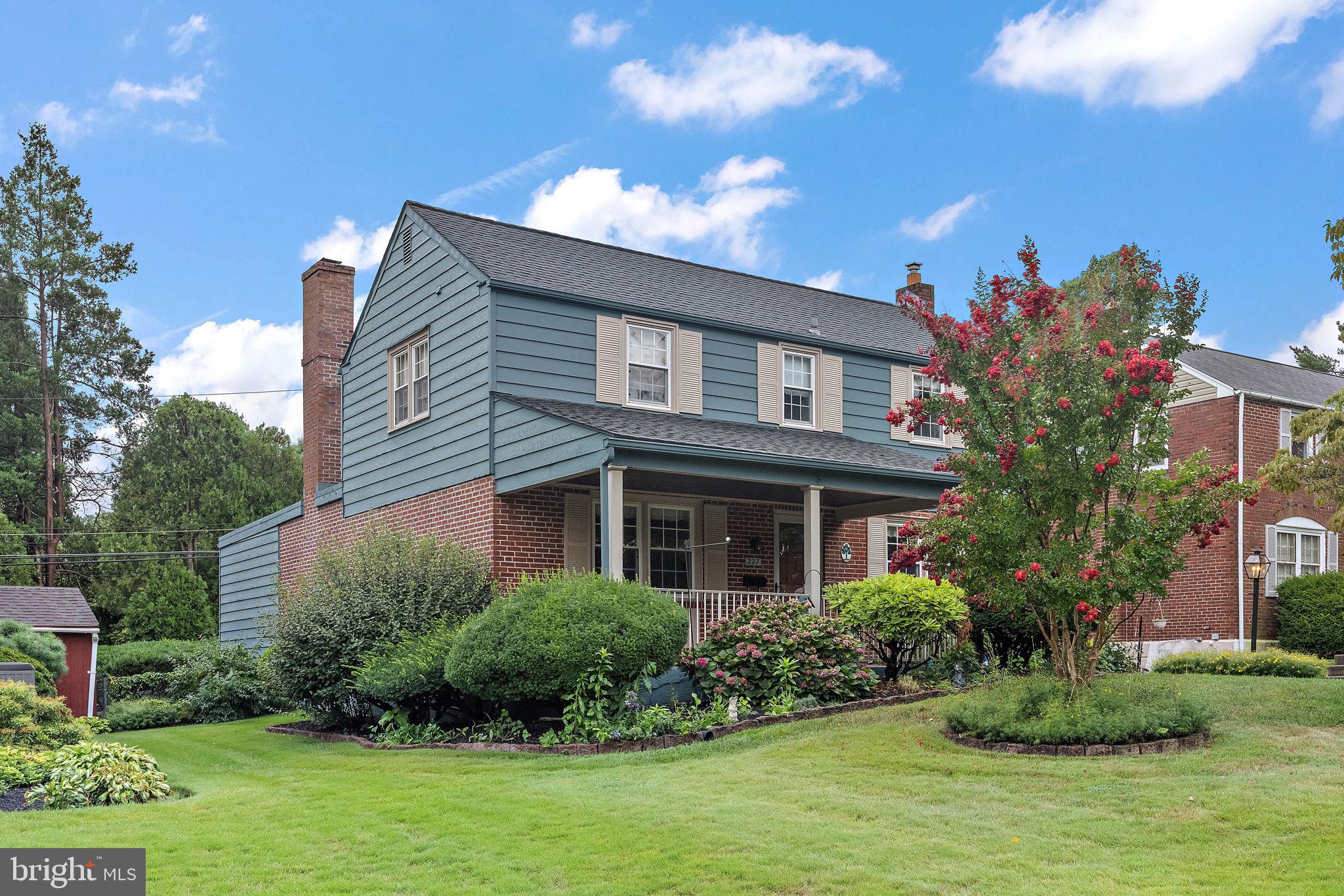227 Pine Ridge Road Havertown, PA 19083 - Photo 3 of 36 a front view of a house with a yard