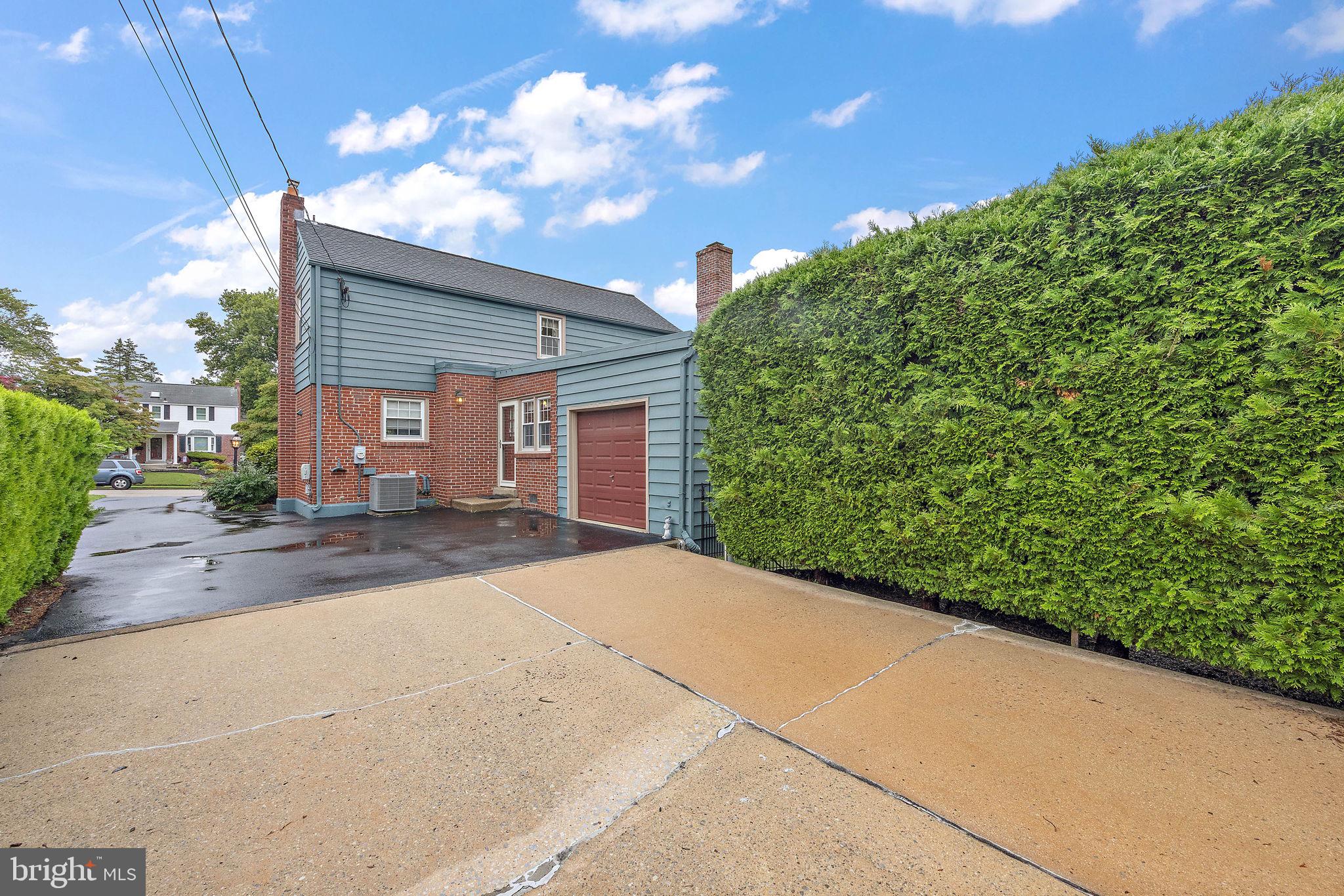 227 Pine Ridge Road Havertown, PA 19083 - Photo 32 of 36 a view of a house with a backyard