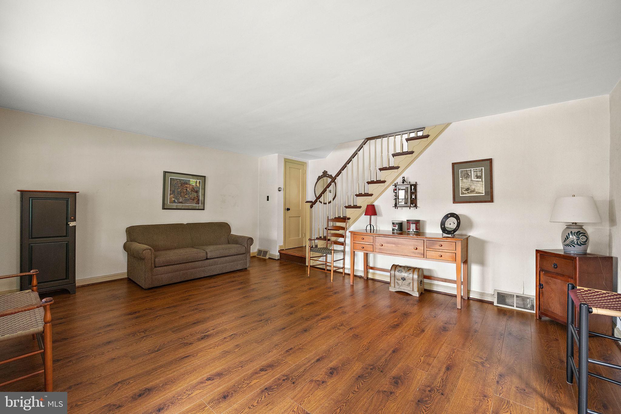 227 Pine Ridge Road Havertown, PA 19083 - Photo 6 of 36 a living room with furniture and a wooden floor