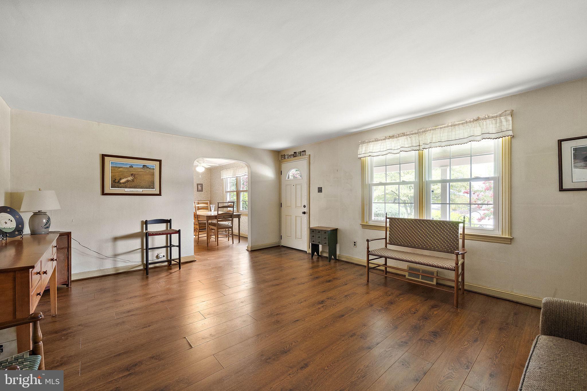 227 Pine Ridge Road Havertown, PA 19083 - Photo 7 of 36 a living room with furniture and wooden floor