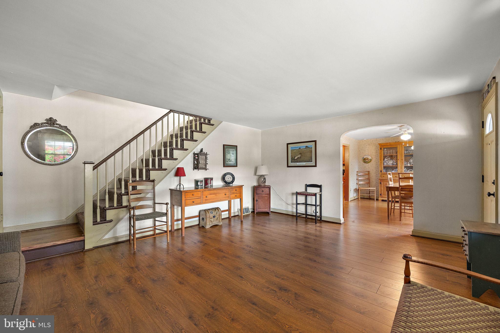 227 Pine Ridge Road Havertown, PA 19083 - Photo 8 of 36 a view of entryway and hall with wooden floor