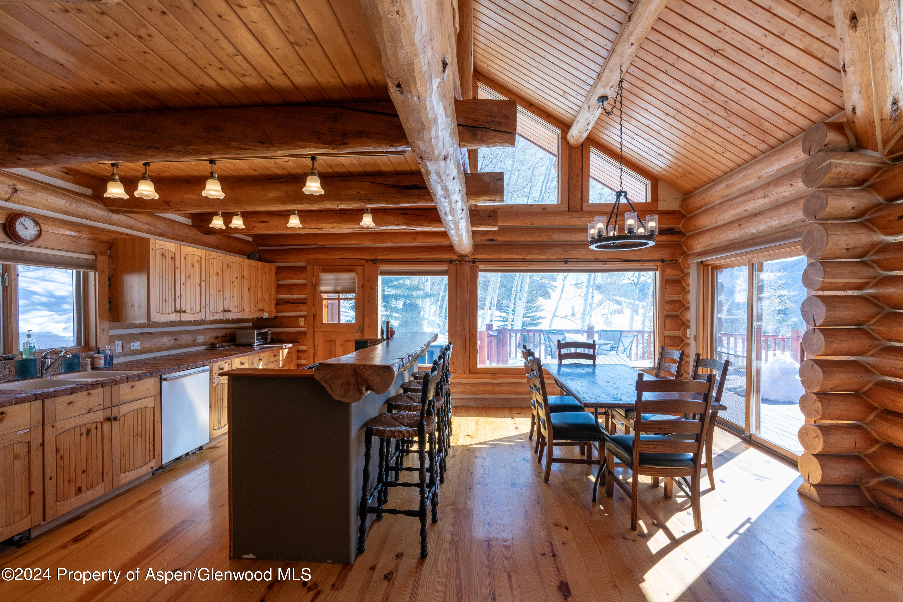 491 McLaughlin Lane Basalt, CO 81621 - Photo 2 of 56 a view of a dining room with furniture window and wooden floor