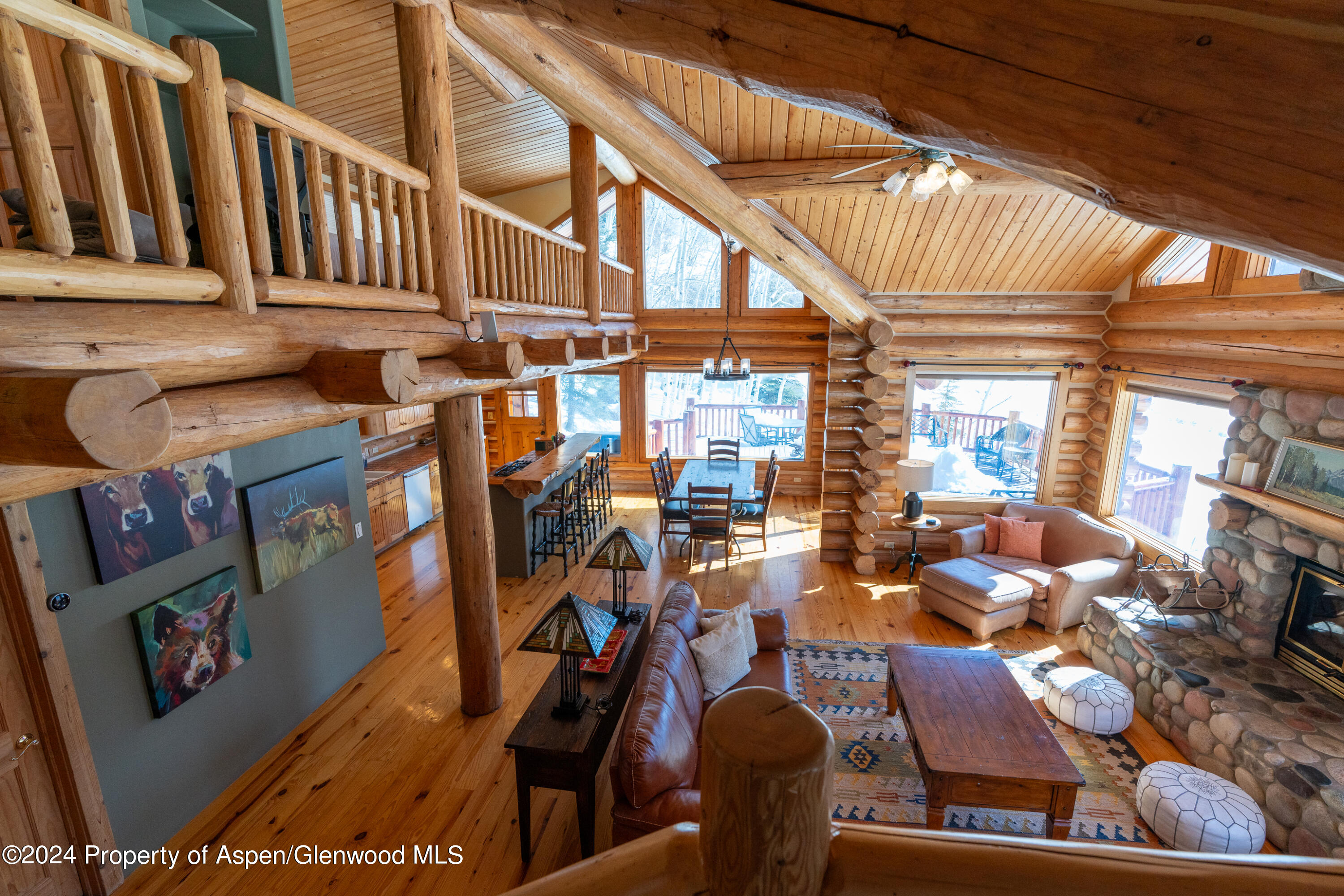 491 McLaughlin Lane Basalt, CO 81621 - Photo 24 of 56 a view of gym equipment and living room with furniture