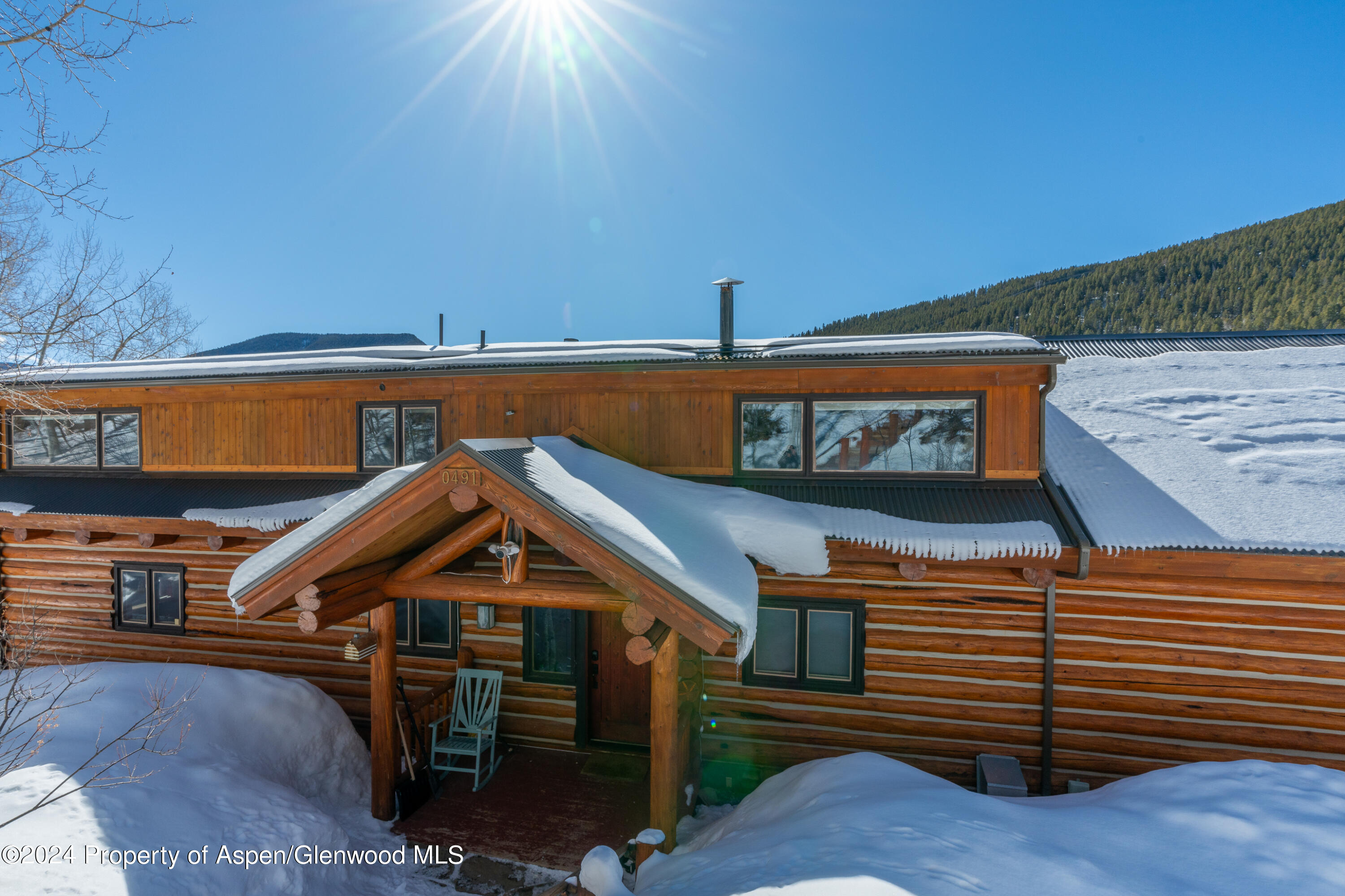 491 McLaughlin Lane Basalt, CO 81621 - Photo 49 of 56 a front view of a house with wooden stairs