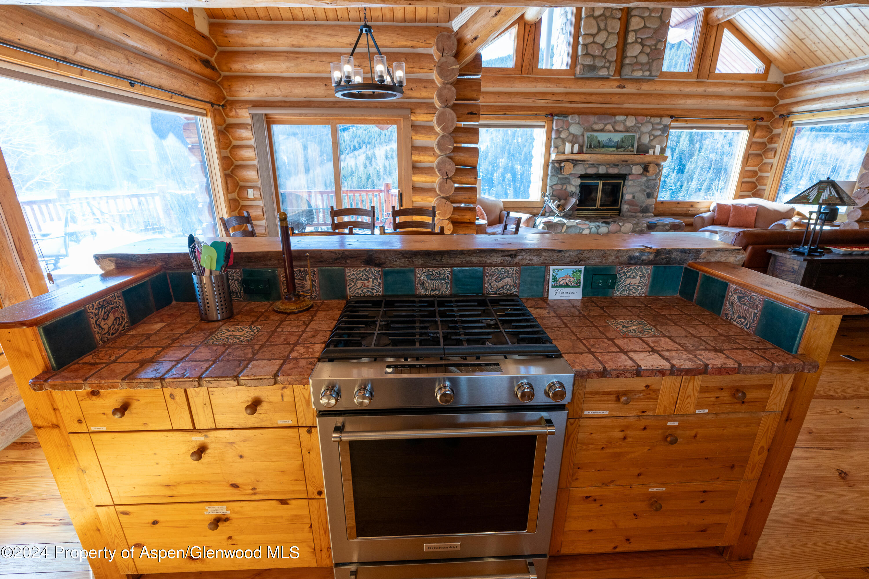 491 McLaughlin Lane Basalt, CO 81621 - Photo 6 of 56 a open kitchen with stainless steel appliances granite countertop a stove and a sink