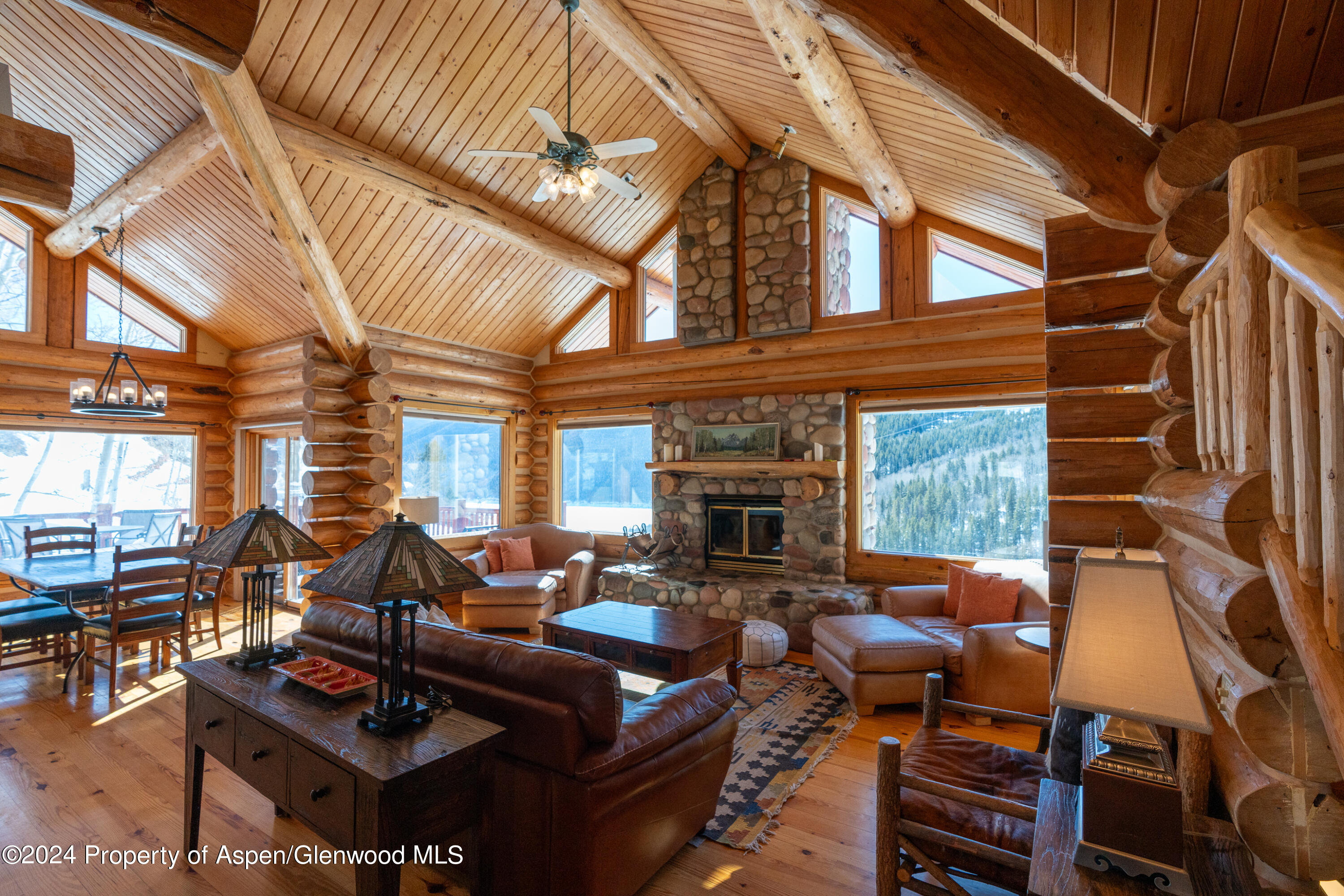 491 McLaughlin Lane Basalt, CO 81621 - Photo 8 of 56 a view of a patio with couches table and chairs