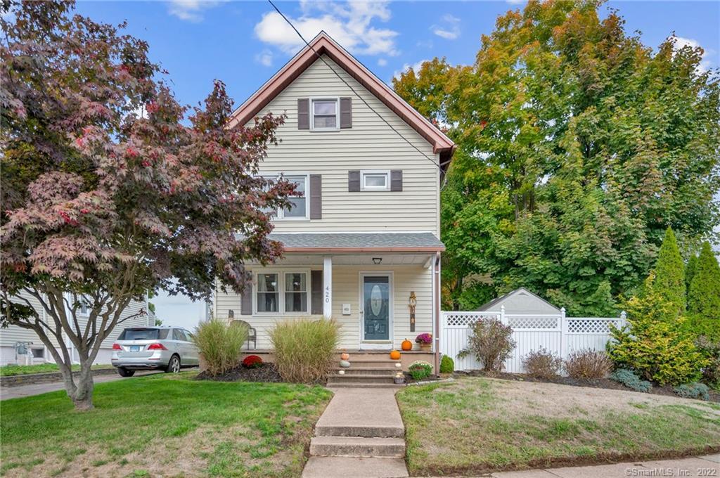 420 Lighthouse Road New Haven, CT 06512 - Photo 1 of 1 a front view of a house with a garden and yard