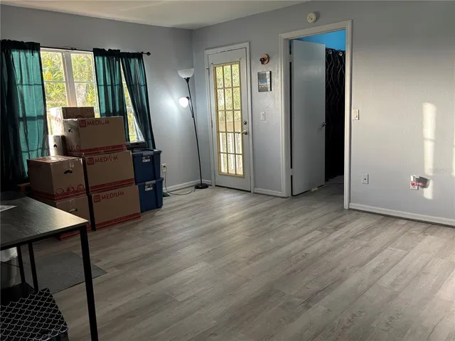 a room with furniture and window