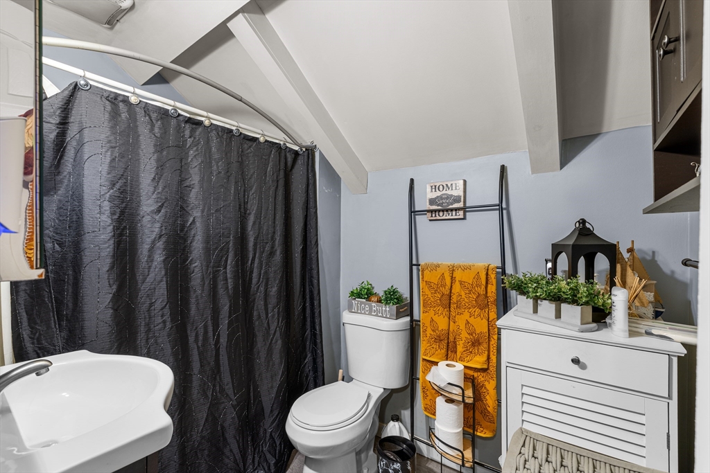 808 Walnut Street Fall River, MA 02720 - Photo 14 of 29 a bathroom with a sink toilet and shower