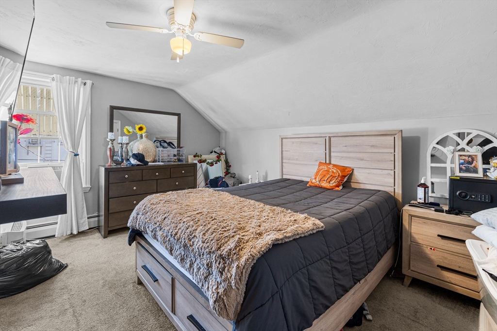 808 Walnut Street Fall River, MA 02720 - Photo 17 of 29 a bedroom with a bed and a dresser