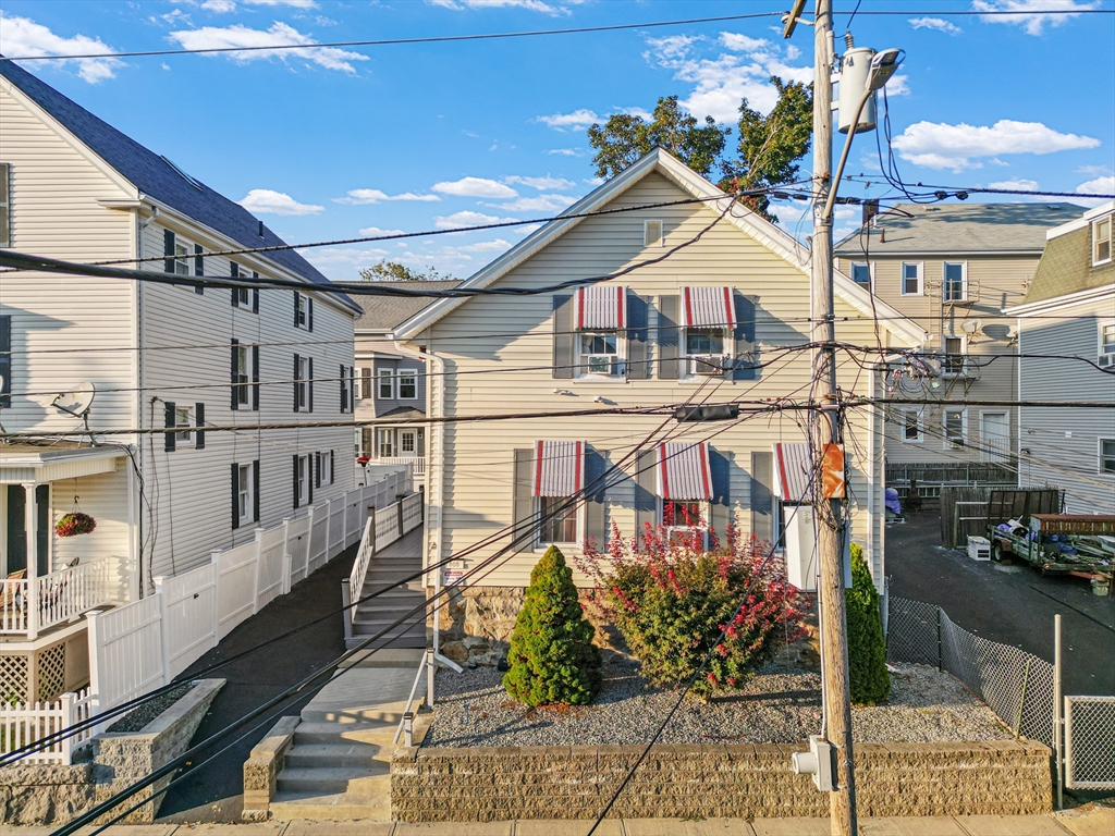 808 Walnut Street Fall River, MA 02720 - Photo 2 of 29 a view of a house with a street