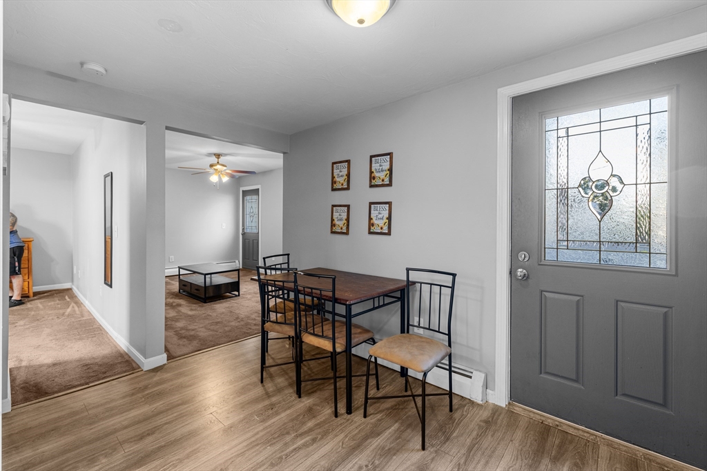 808 Walnut Street Fall River, MA 02720 - Photo 22 of 29 a view of a dining room with furniture and wooden floor