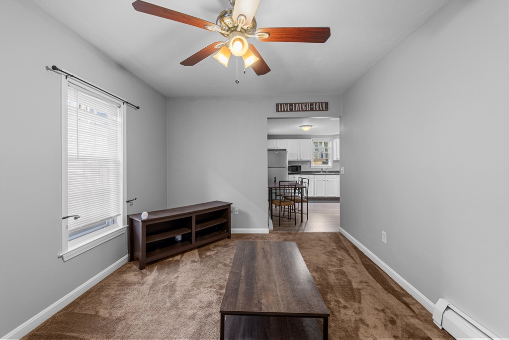 808 Walnut Street Fall River, MA 02720 - Photo 24 of 29 a view of workspace and bedroom with furniture