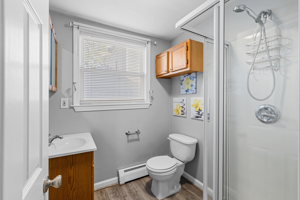 808 Walnut Street Fall River, MA 02720 - Photo 29 of 29 a bathroom with a toilet sink and shower