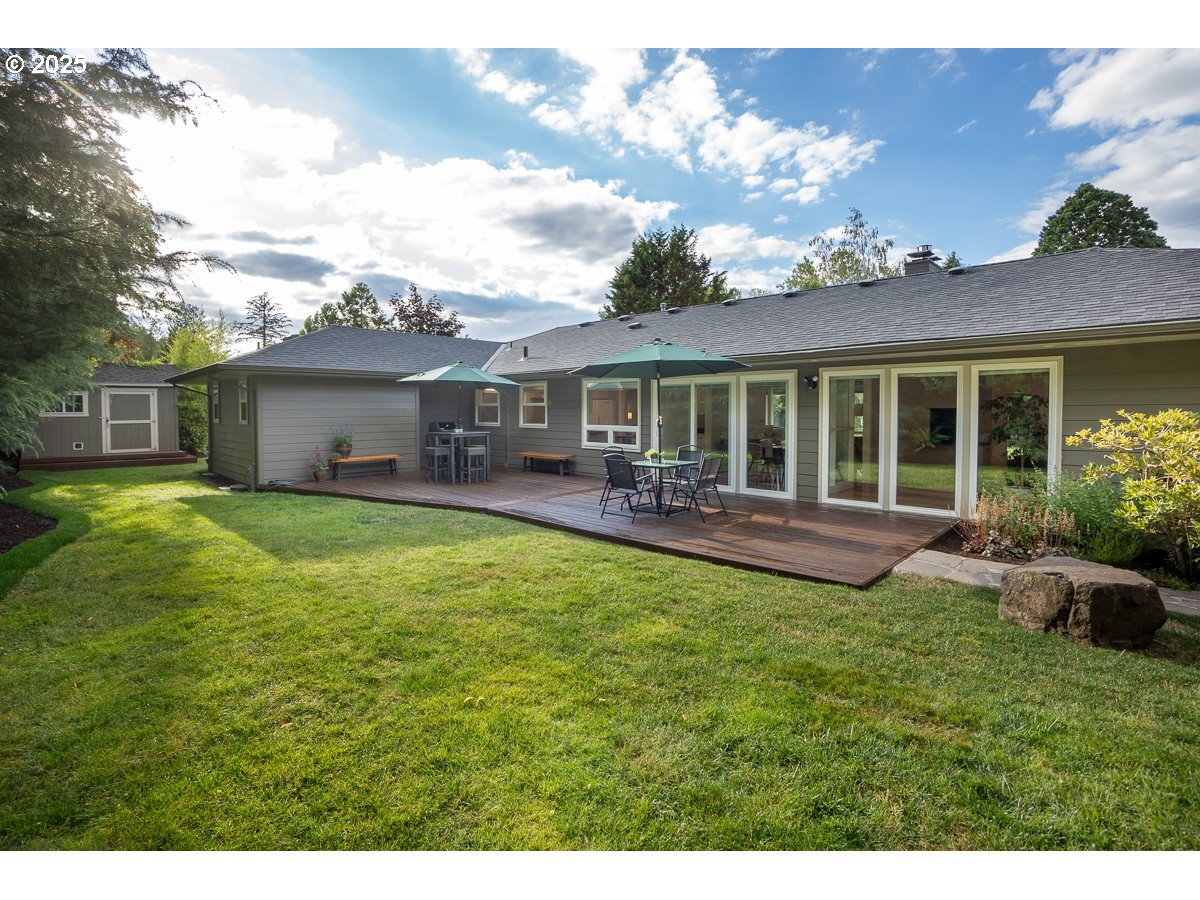 9040 Southwest Rambler Lane Portland, OR 97223 - Photo 32 of 46 a house view with swimming pool and garden space