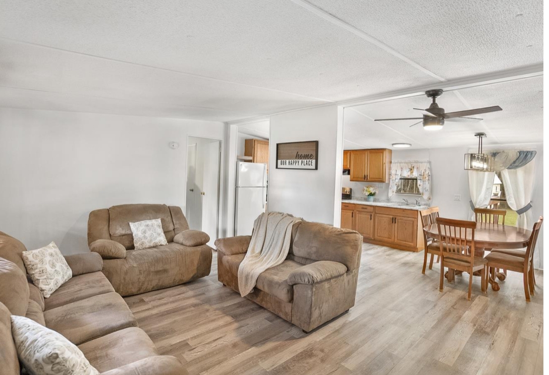4410 Rues Landing Road St. Augustine, FL 32092 - Photo 4 of 19 a living room with furniture and view of kitchen