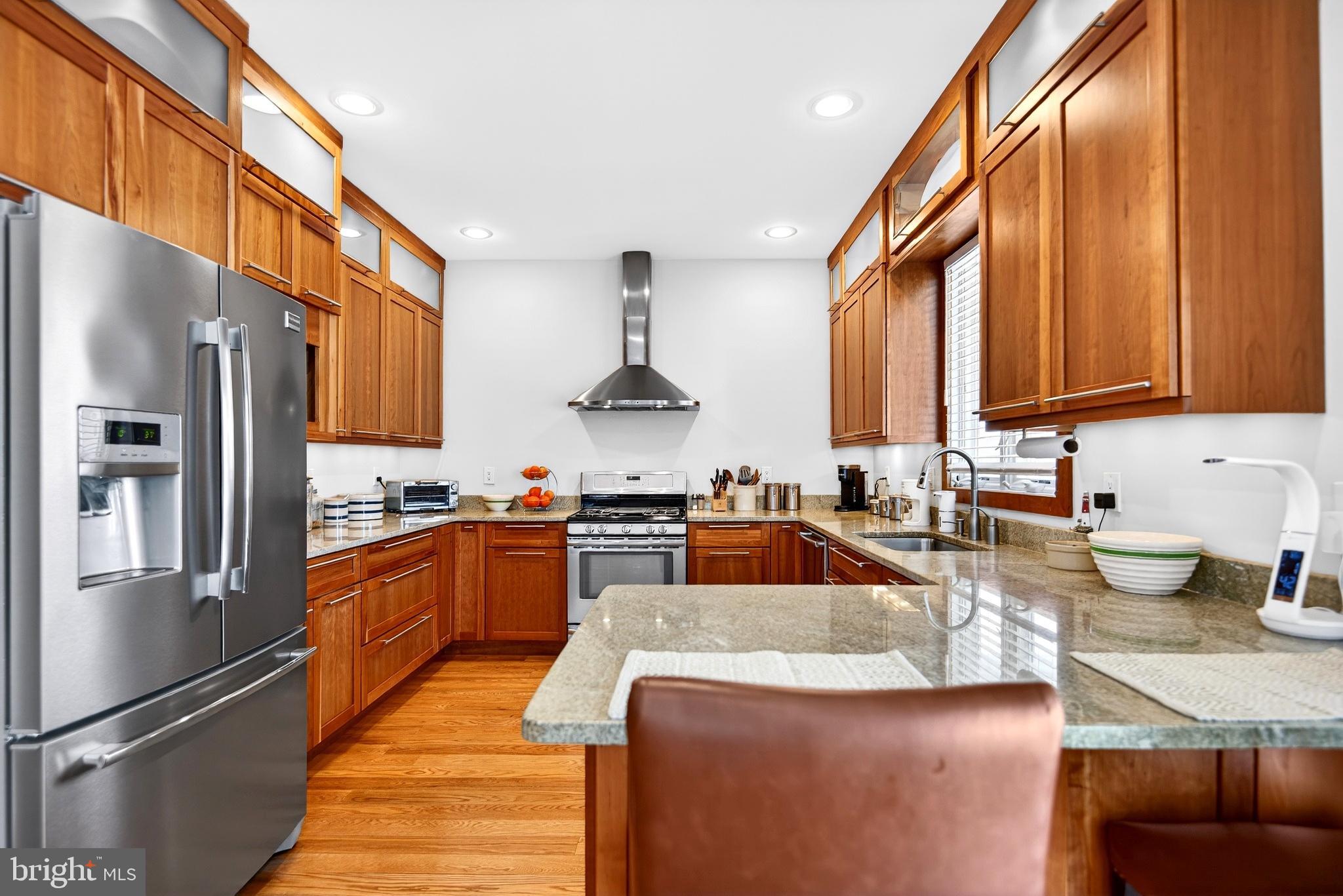 20 Edgewater Drive Tuckerton, NJ 08087 - Photo 14 of 78 a large kitchen with stainless steel appliances granite countertop a sink a stove and a refrigerator