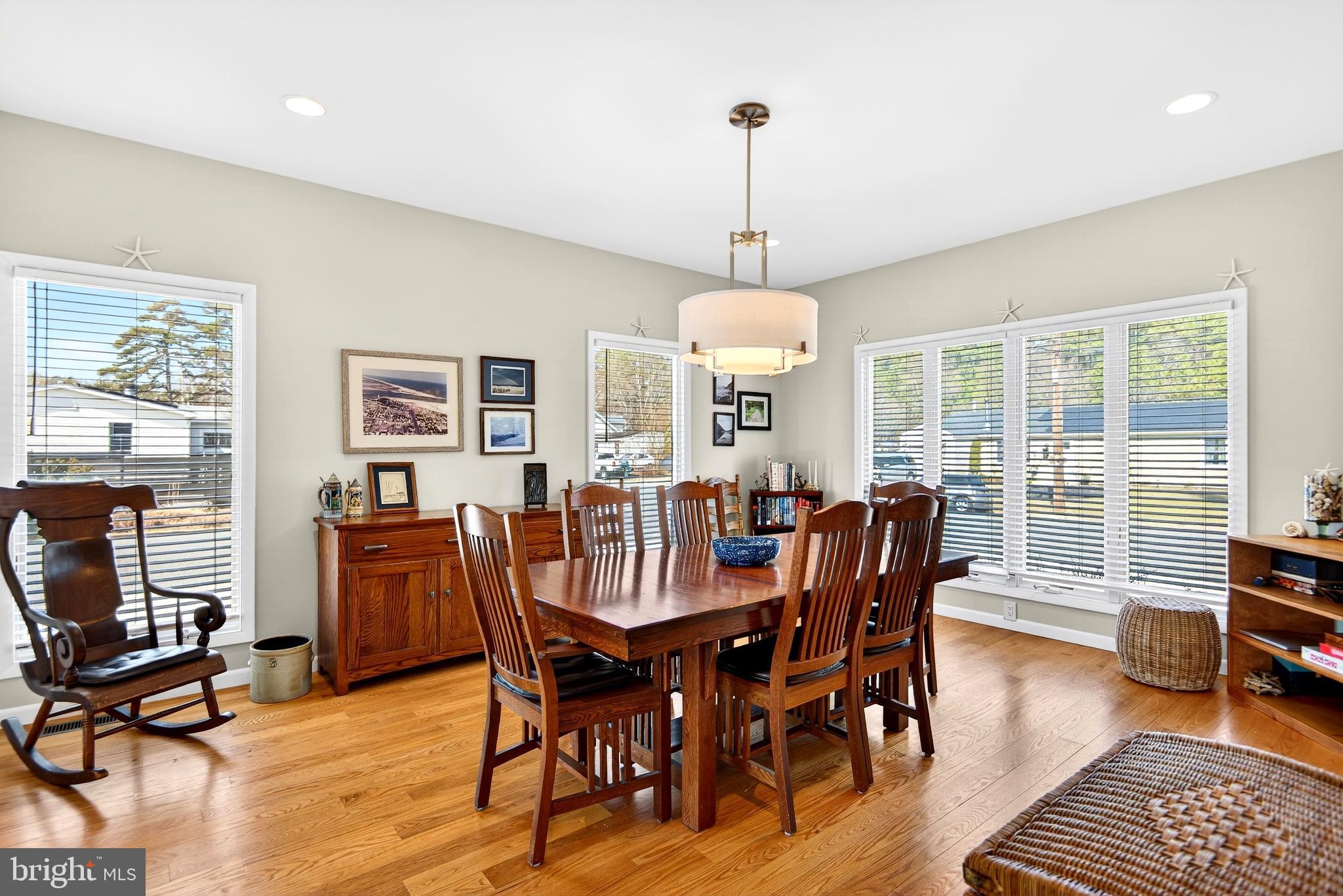 20 Edgewater Drive Tuckerton, NJ 08087 - Photo 16 of 78 a view of a dining room with furniture window and wooden floor