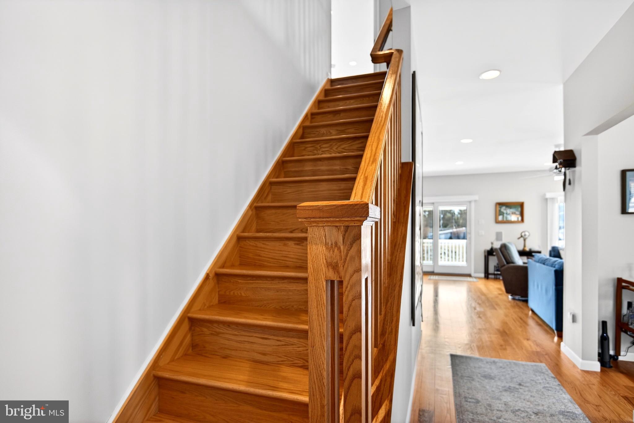 20 Edgewater Drive Tuckerton, NJ 08087 - Photo 25 of 78 a view of staircase with wooden floor and a rug