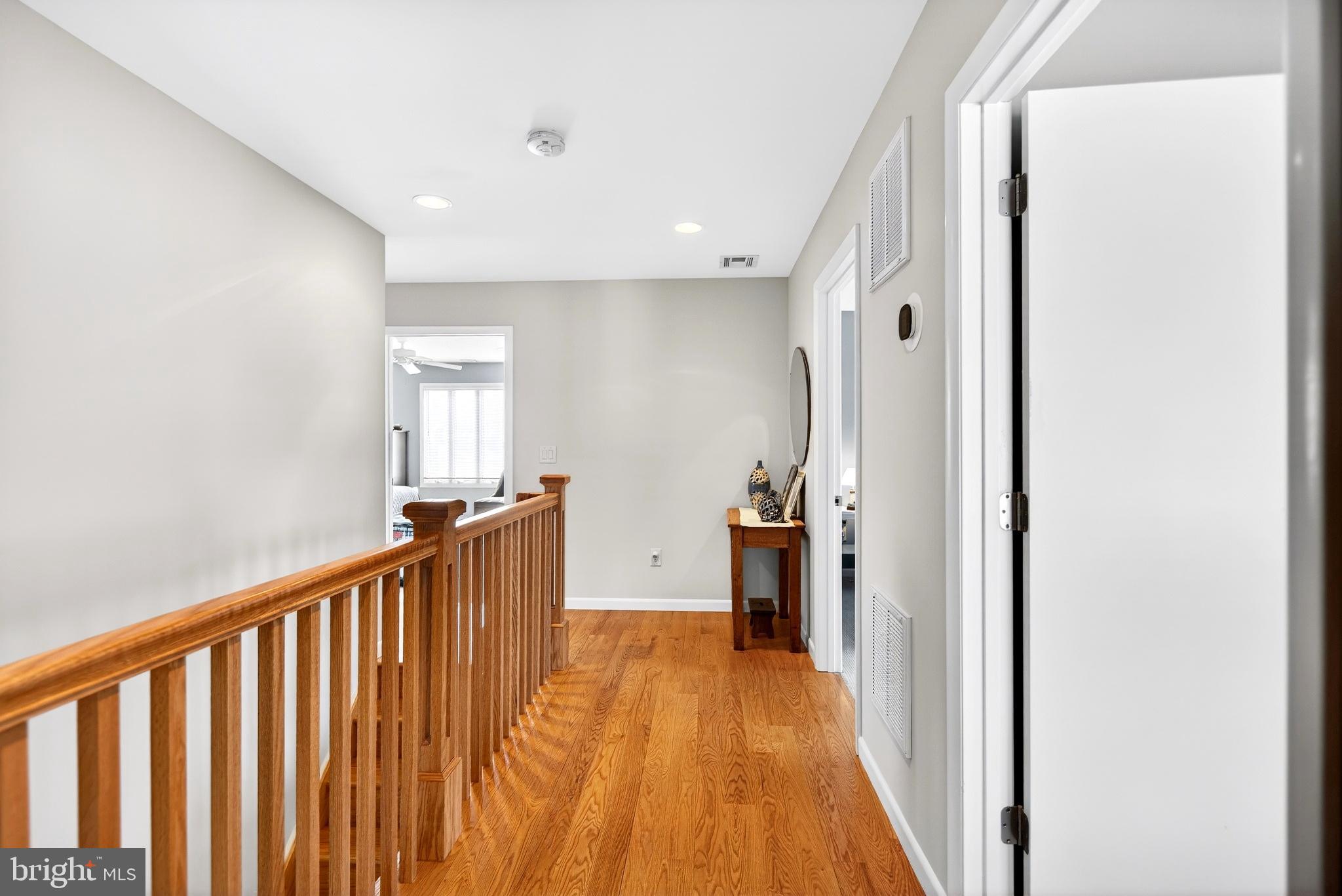 20 Edgewater Drive Tuckerton, NJ 08087 - Photo 27 of 78 a view of a hallway with wooden floor and staircase