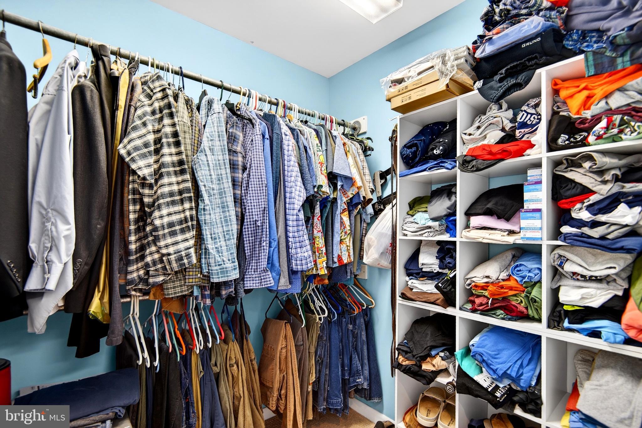 20 Edgewater Drive Tuckerton, NJ 08087 - Photo 32 of 78 a view of walk in closet with clothes and shoes