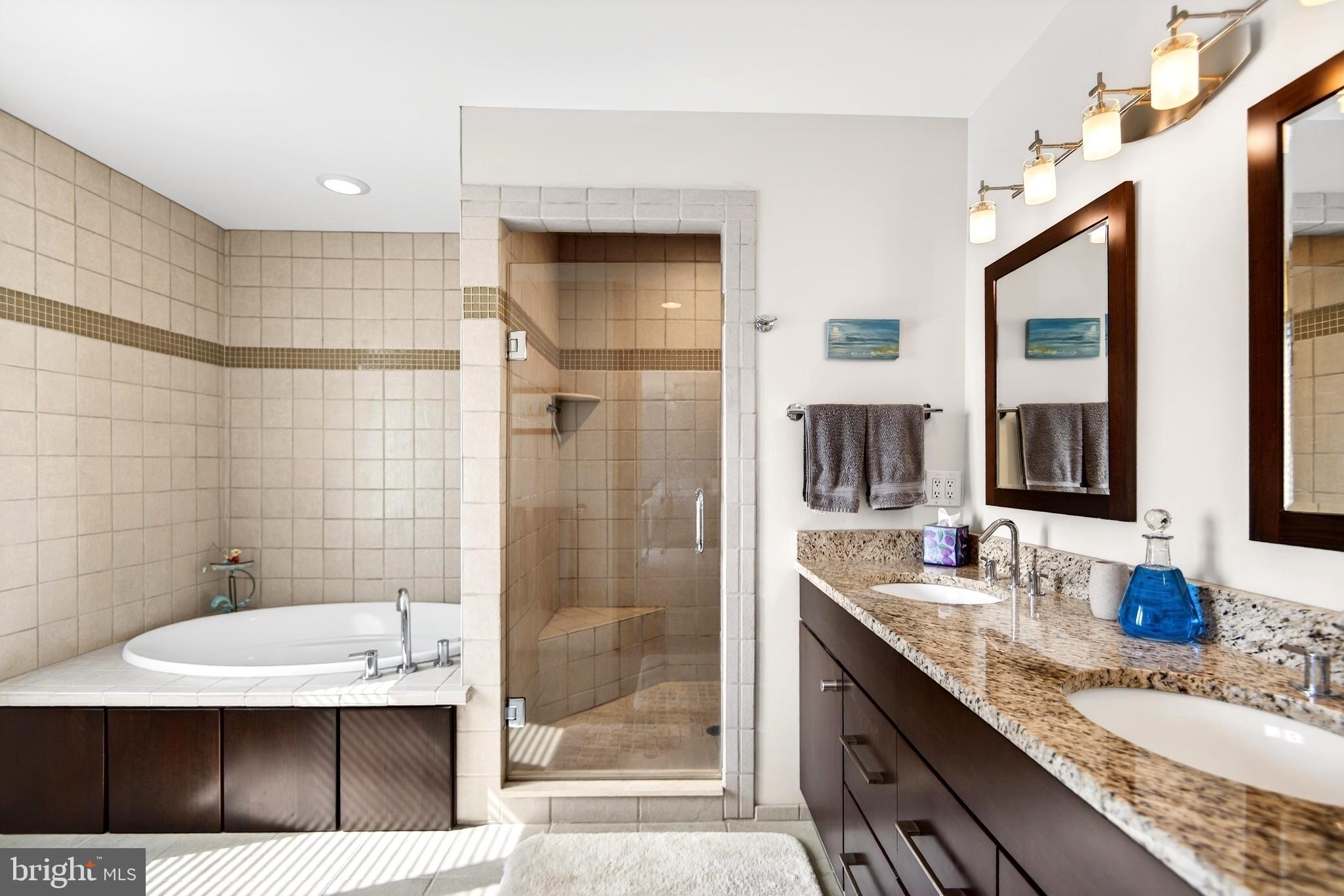 20 Edgewater Drive Tuckerton, NJ 08087 - Photo 35 of 78 a bathroom with a granite countertop sink a mirror and shower