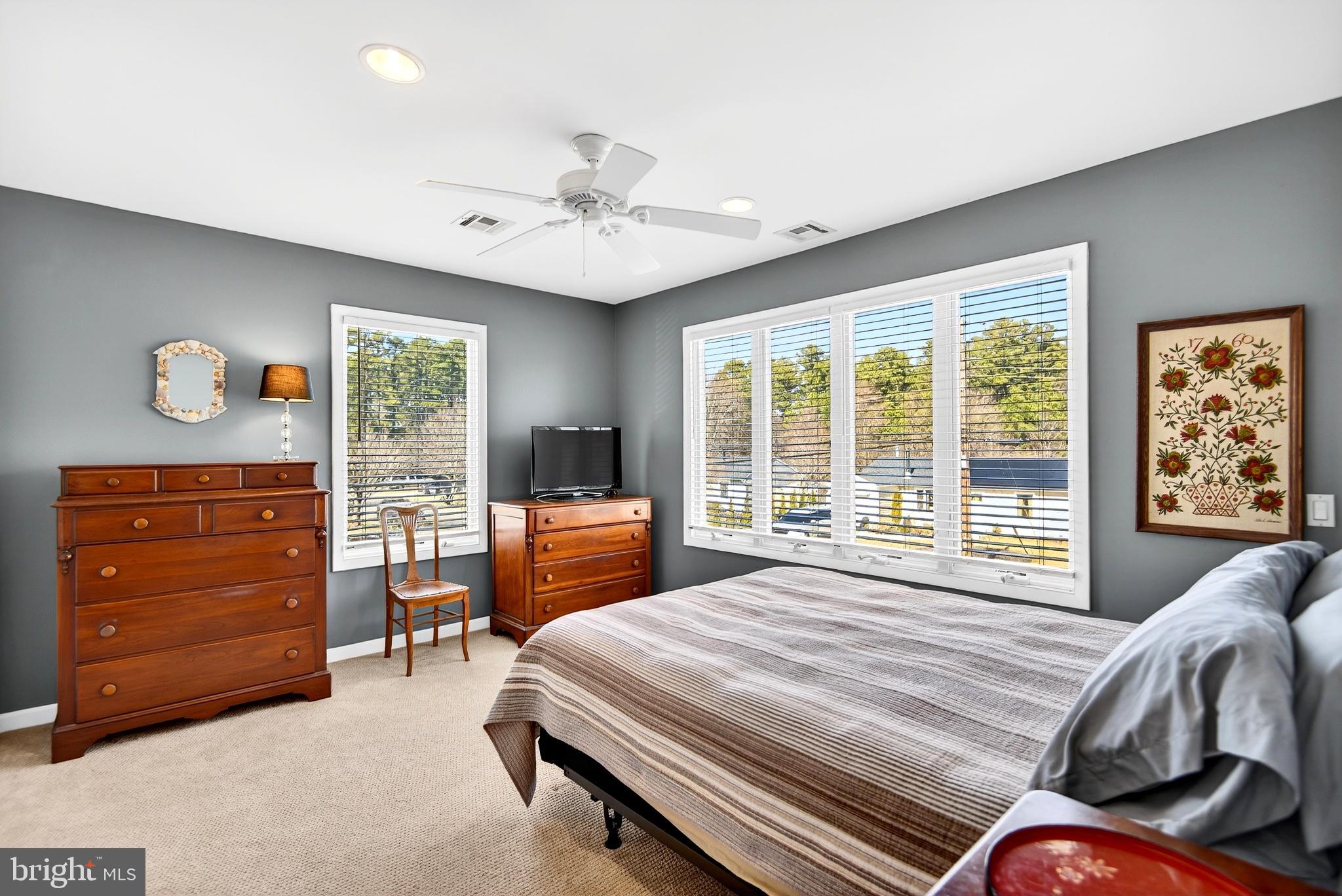 20 Edgewater Drive Tuckerton, NJ 08087 - Photo 36 of 78 a bedroom with a bed and wooden floor