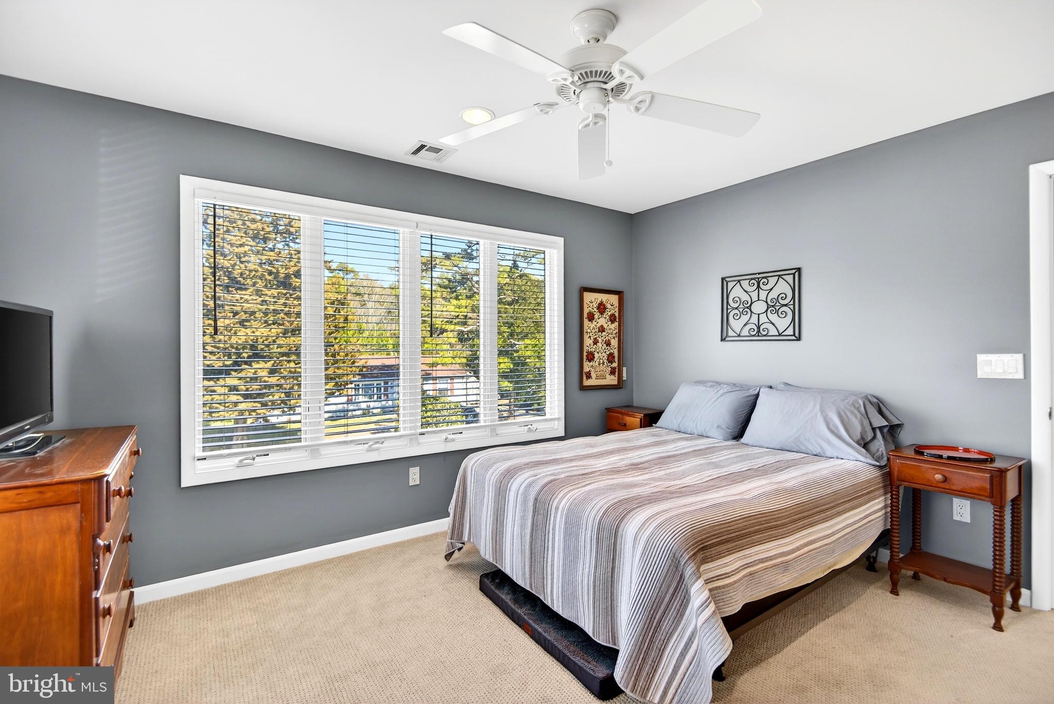 20 Edgewater Drive Tuckerton, NJ 08087 - Photo 37 of 78 a bedroom with a large bed and a window