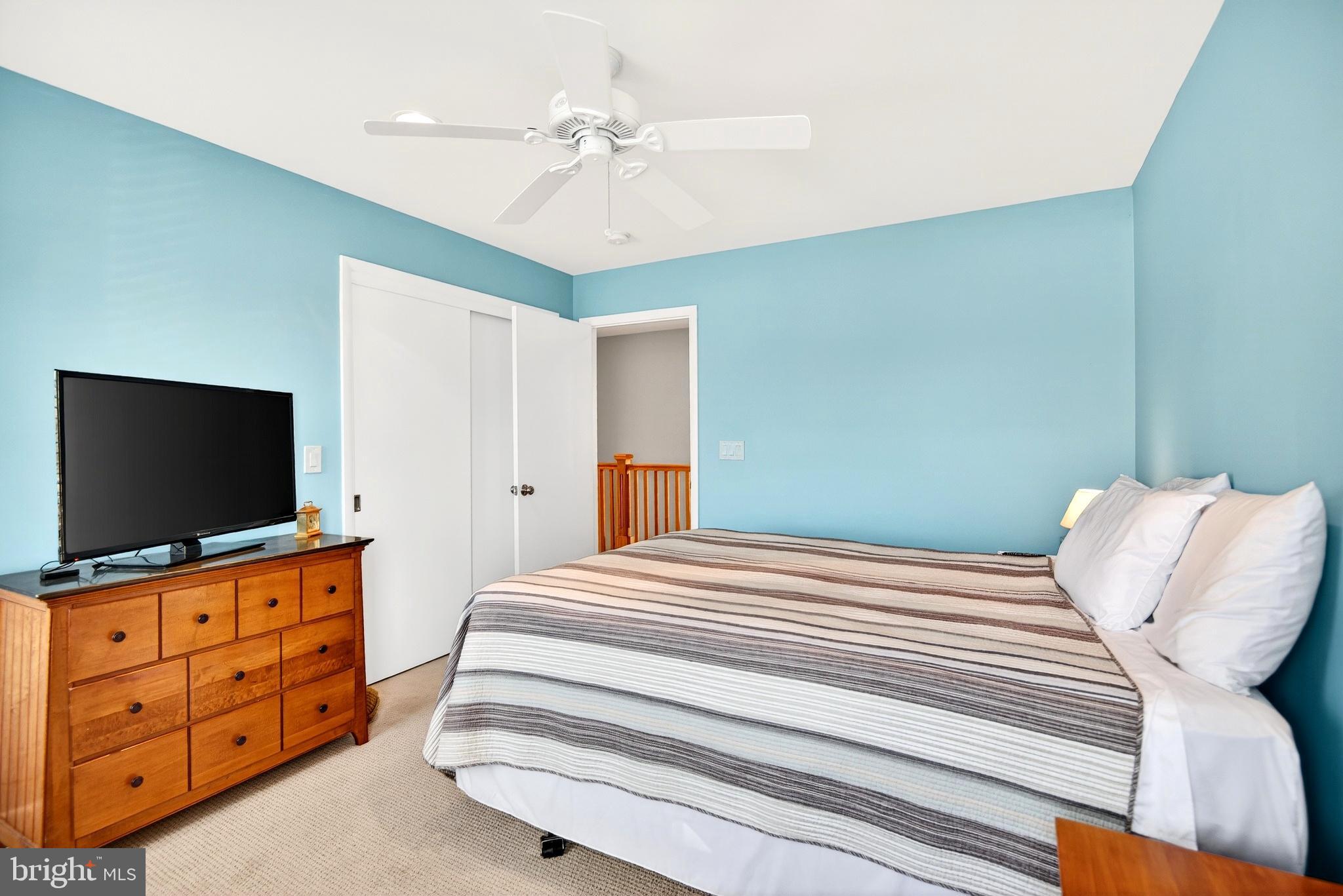 20 Edgewater Drive Tuckerton, NJ 08087 - Photo 41 of 78 a bedroom with a bed and a flat screen tv