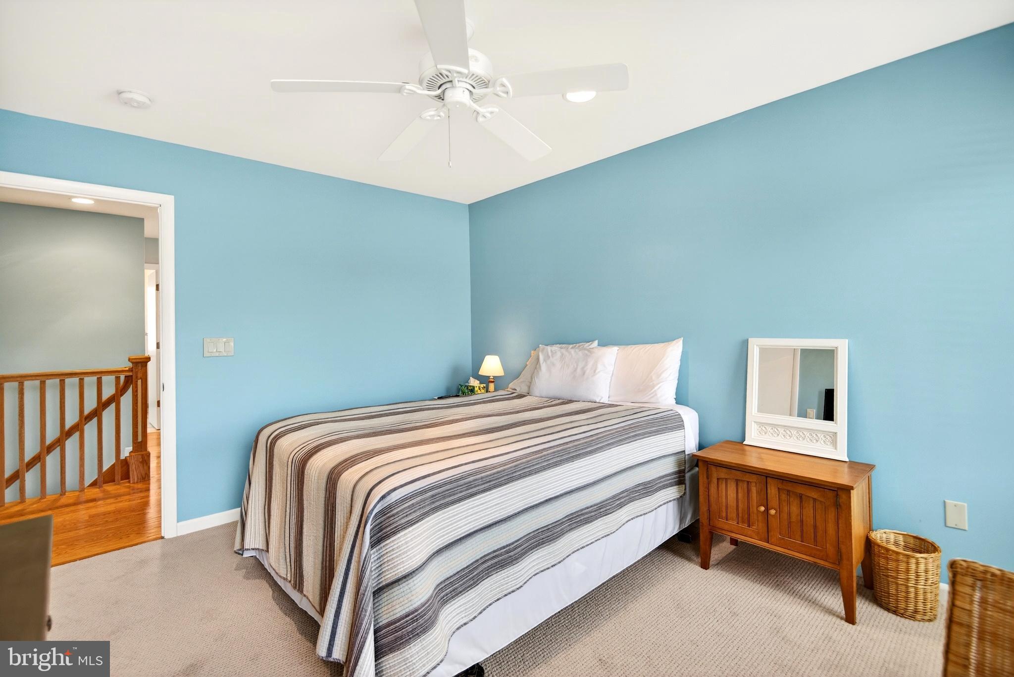 20 Edgewater Drive Tuckerton, NJ 08087 - Photo 42 of 78 a bedroom with a bed and a chandelier