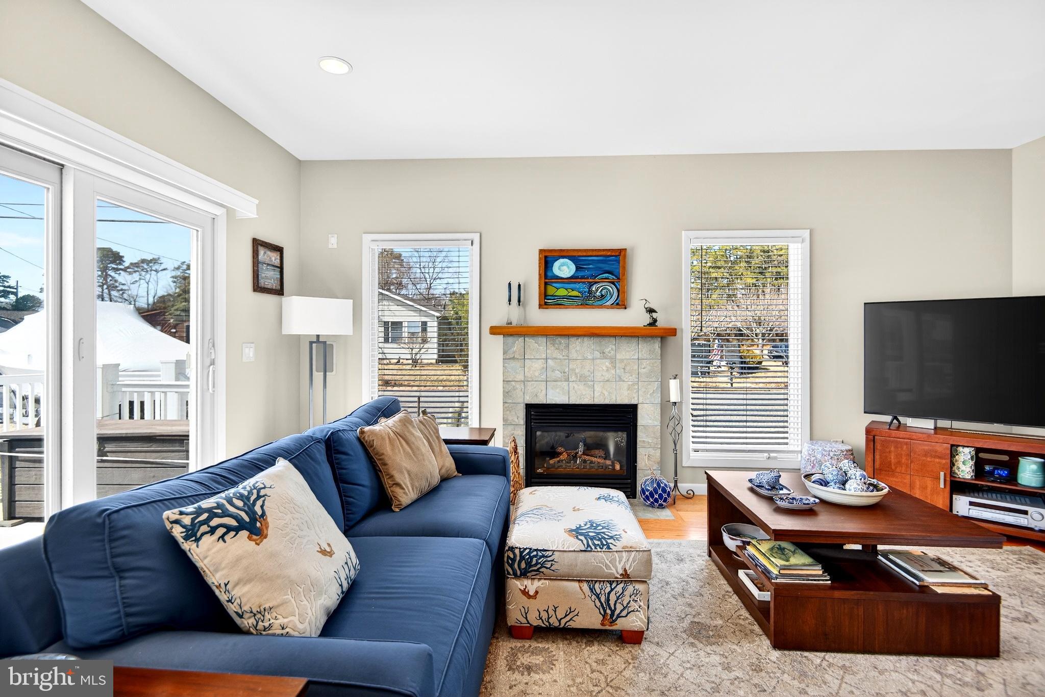 20 Edgewater Drive Tuckerton, NJ 08087 - Photo 5 of 78 a living room with furniture and a fireplace