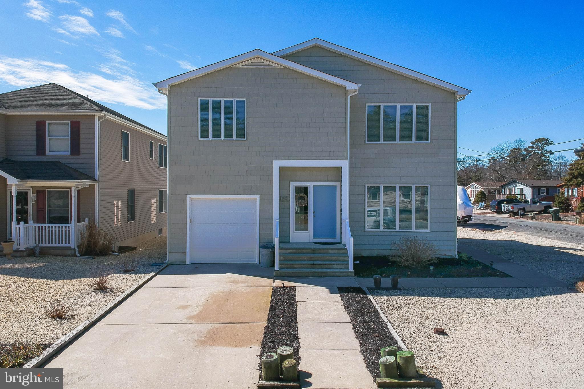 20 Edgewater Drive Tuckerton, NJ 08087 - Photo 56 of 78 a front view of a house with a yard