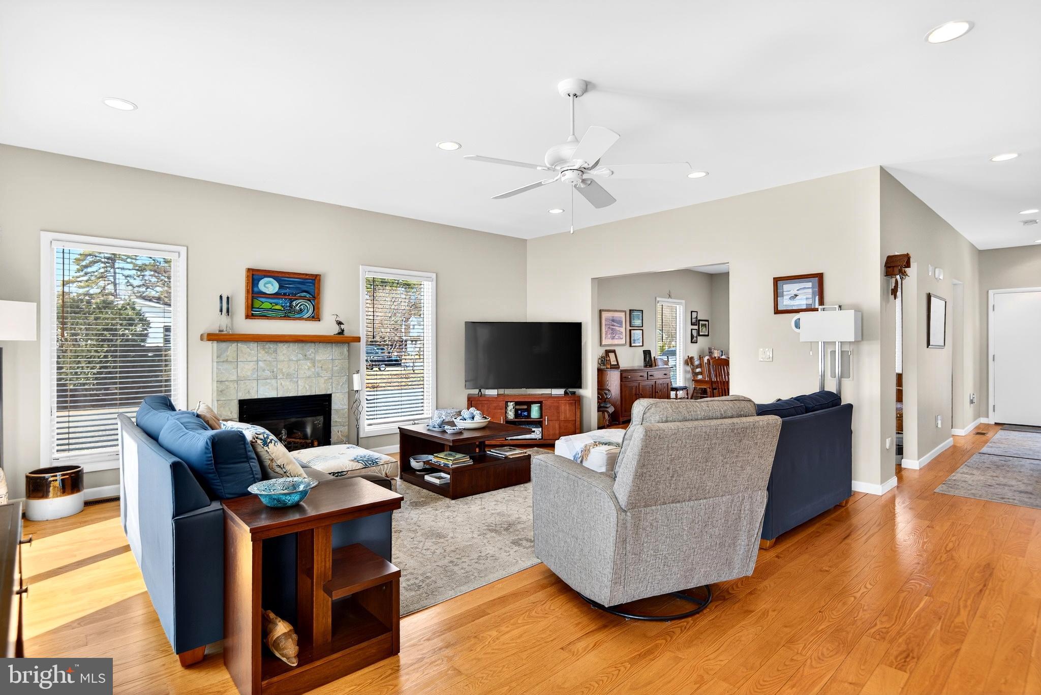 20 Edgewater Drive Tuckerton, NJ 08087 - Photo 6 of 78 a living room with fireplace furniture and a wooden floor