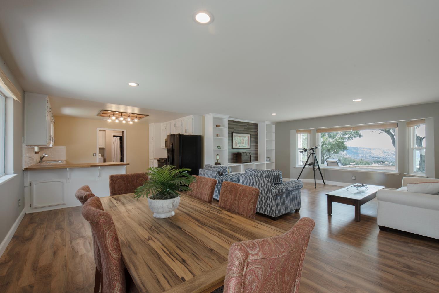 29395 Revis Road Coarsegold, CA 93614 - Photo 15 of 32 a view of a dining room with furniture window and outside view