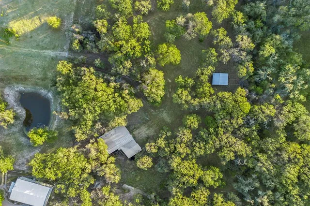 a backyard of a house with lots of green space