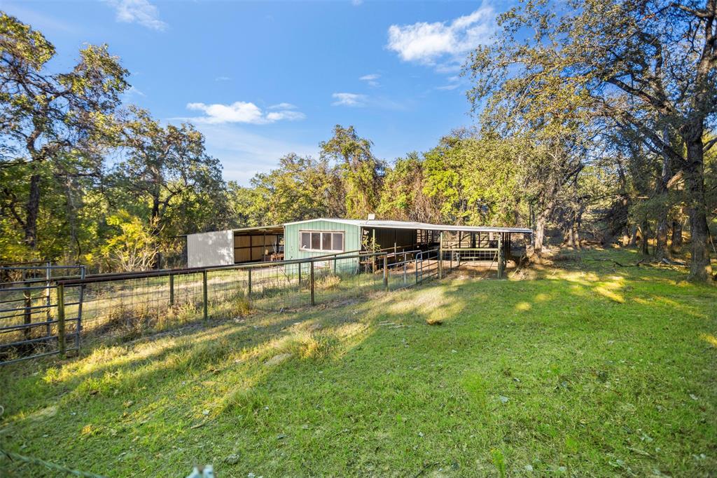 199 Cheyenne Trail Springtown, TX 76082 - Photo 8 of 22 a view of a house with pool