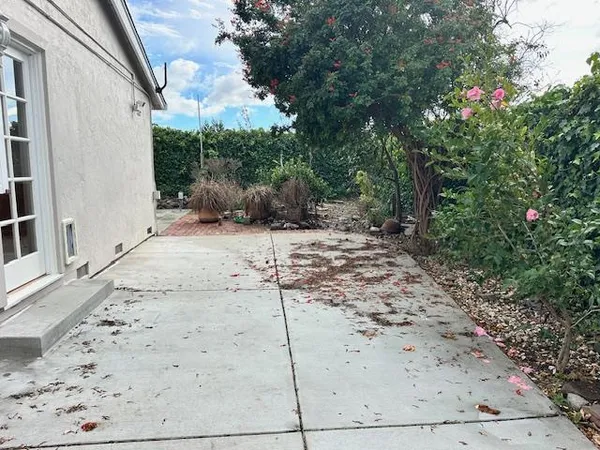a view of a backyard of a house