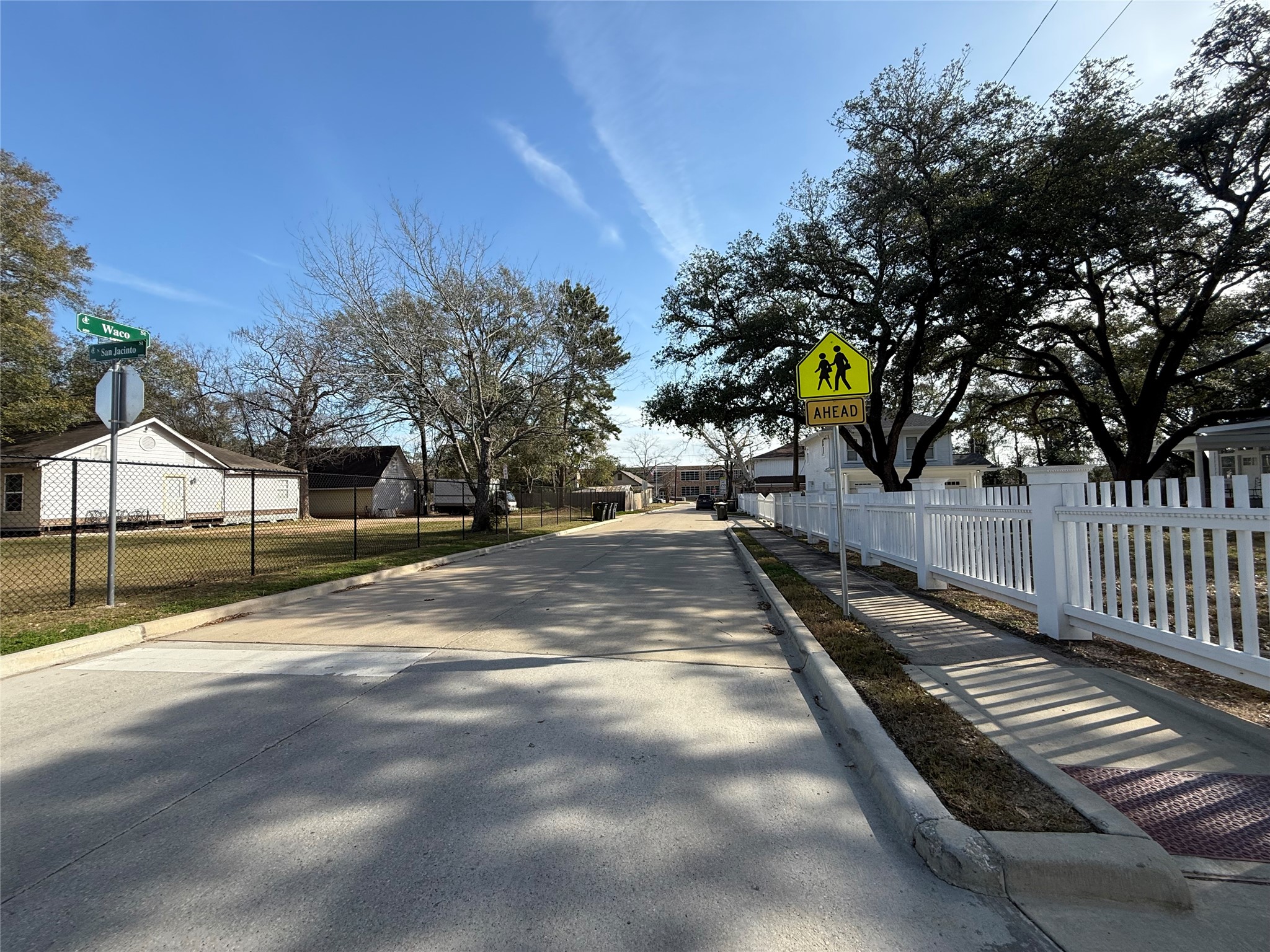 412 Waco Street Conroe, TX 77301 - Photo 43 of 50 a view of a yard with wooden fence