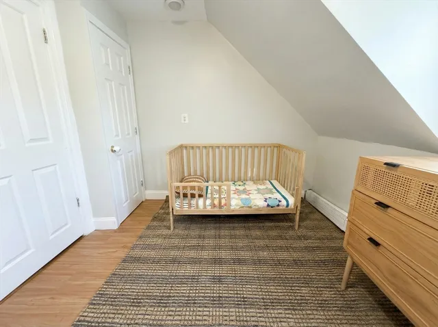 a view of front door with wooden floor