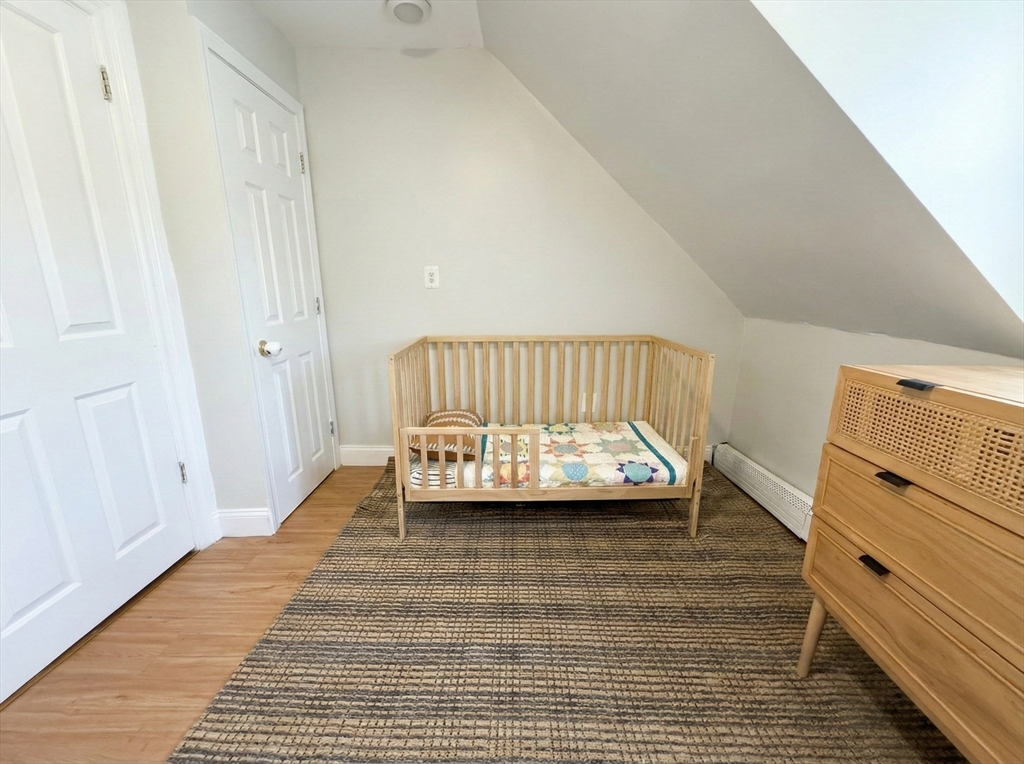 20 Fellsway West, Unit 2 Somerville, MA 02145 - Photo 11 of 17 a view of front door with wooden floor