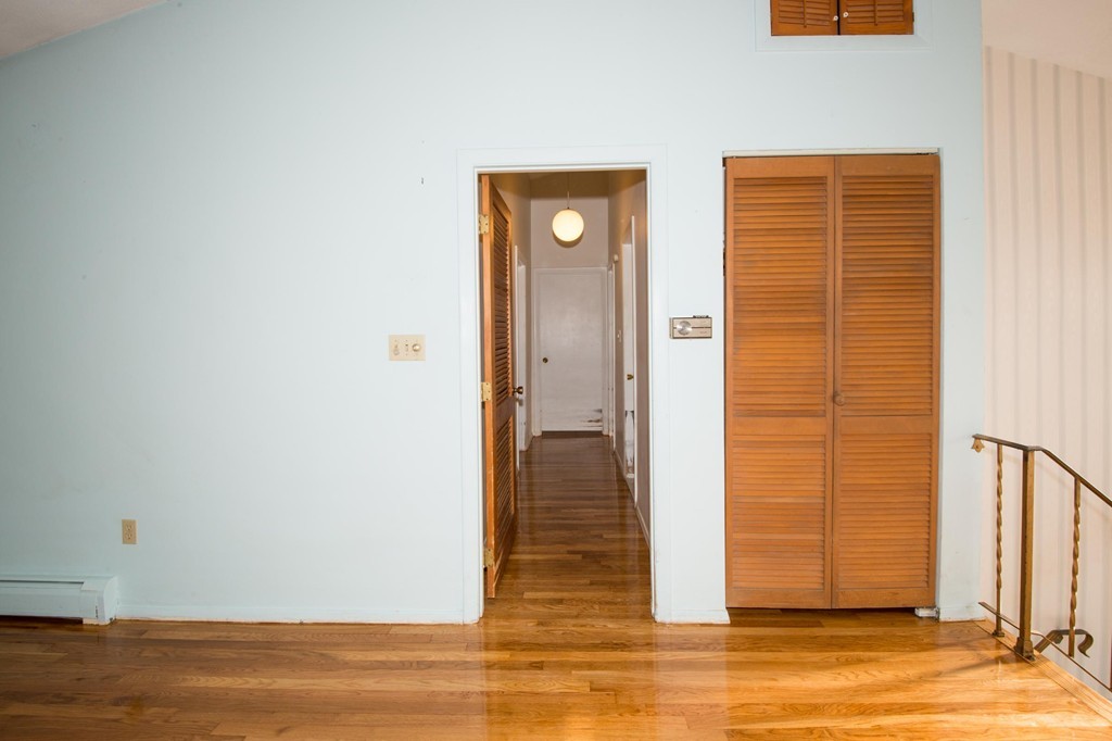 9 Fatima Road Stoneham, MA 02180 - Photo 11 of 26 a view of empty room with wooden floor